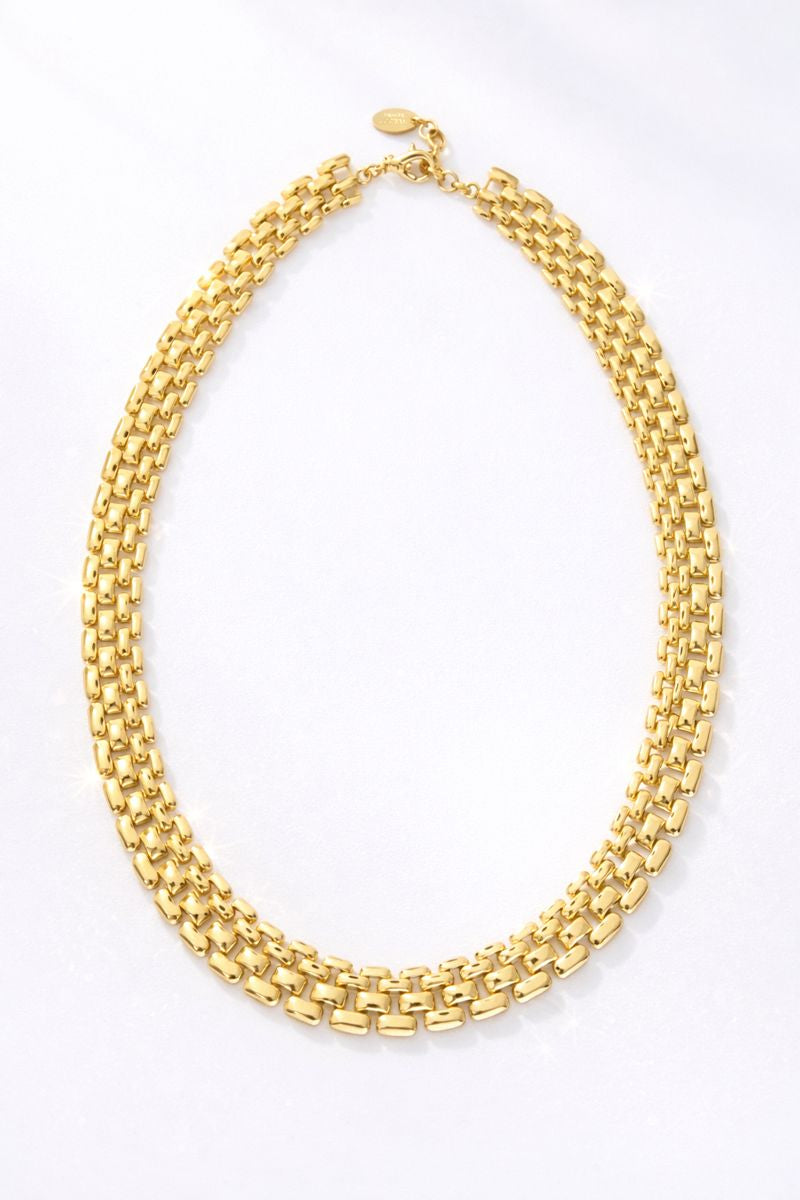 NANNINI pochette pelle nera tracolla borchie catena oro