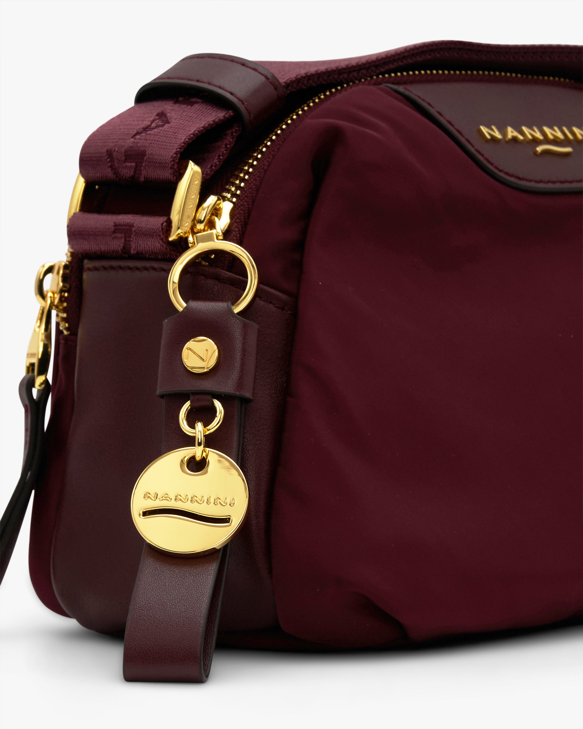 NANNINI borsa secchiello pelle marrone manico tessuto stampa